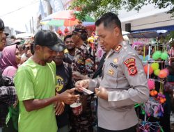 Di Sela-sela Acara Helaran Seni Hari Jadi Kota Banjar Ke-20, Kapolres Banjar Berbagi Rezeki dengan Masyarakat